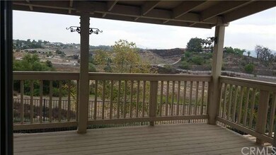 View from Large Covered Balcony (access upstairs M
