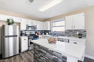 Kitchen featuring appliances with stainless steel