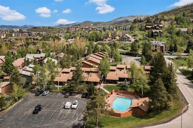 Aerial view of residential area featuring mountain