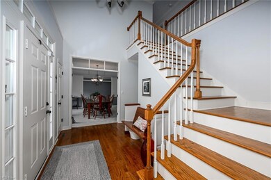 Foyer Features a Turned Staircase