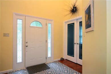 Grand 2 story entry. Double entry door to Formal L