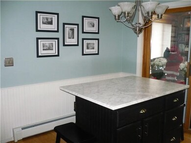 Kitchen. Kitchen island with seating and more cabi