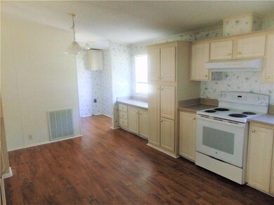 View of eat in area in kitchen towards inside laud