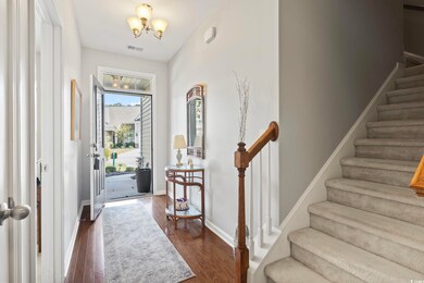 Entryway featuring dark hardwood / wood-style floo