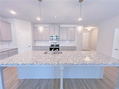 Kitchen with appliances with stainless steel finis