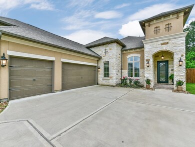 Attached 3 car garage with double driveway parking