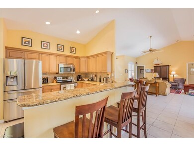 Spacious kitchen with large eat-in bar