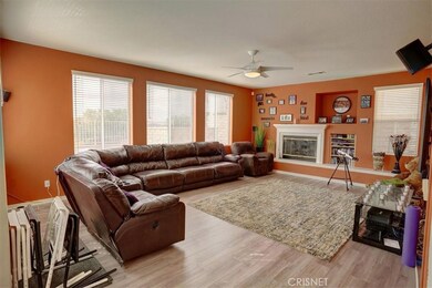 Spacious family room, fireplace and tons of light, bright windows.