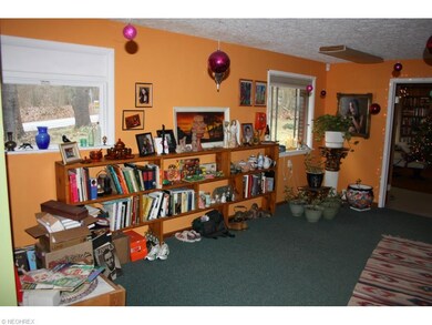 To the right of the Foyer is the Family room.  Win