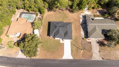 7780 N Sarazen Dr, Citrus Springs, FL 34434 - photo 4