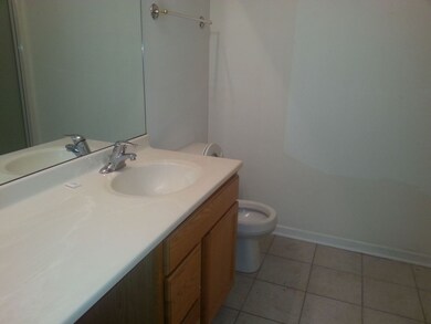 Lower level bathroom, complete with shower.