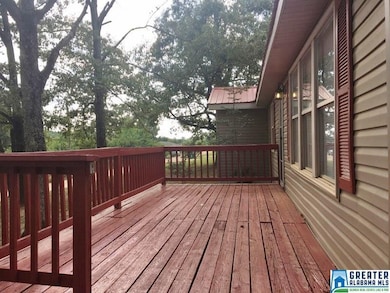 The front porch wraps around to the side deck