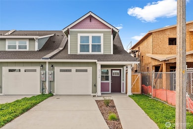 This new construction townhome was built by Tacoma/Pierce County Habitat for Humanity and is ready for its new owner!