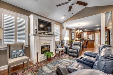 Living room with hardwood / wood-style flooring, l