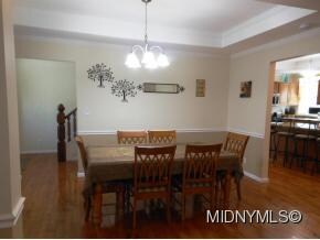 Tray ceiling in room & kitchen