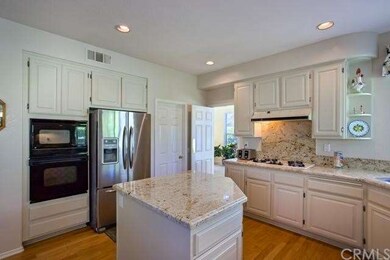 Elegant light colored granite accents this remodel