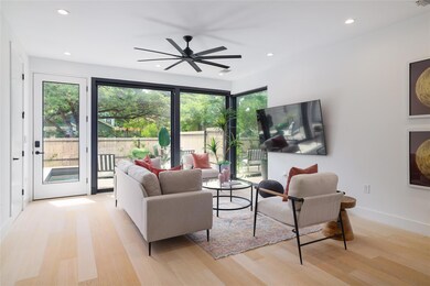 Living room featuring light wood-style flooring, 