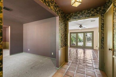 Entry leads to the living room with the formals ju