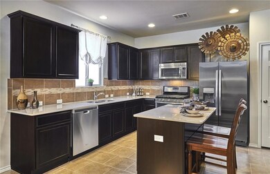 Open island kitchen with granite countertops - *Ph