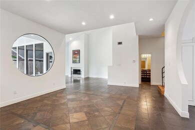 View from the kitchen into the dining area space w