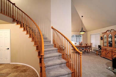 Tiled Entry onto Curved Staircase