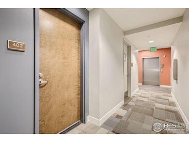 The front door to the unit is conveniently located near the elevator.