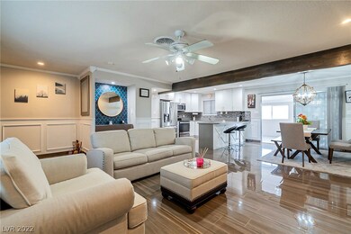 The living room is open to the gorgeous dining are