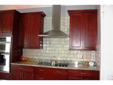 Kitchen. Side by side Kitchenaid refrigerator with