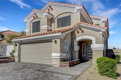 Mediterranean / spanish-style home featuring a til