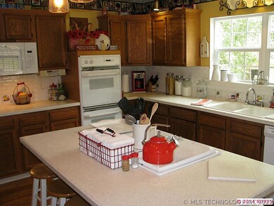 Solid Surface counters, double ovens, family gathe