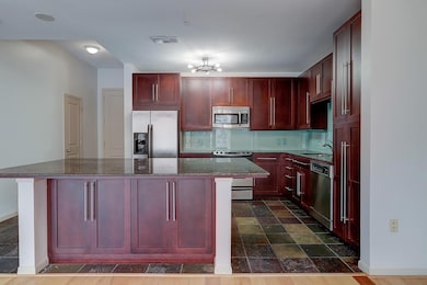 The expansive kitchen island has enough room to se