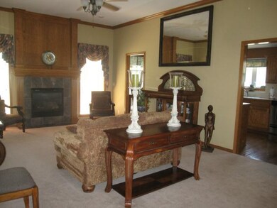 Living Room opens into the kitchen (door on the ri