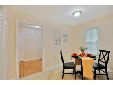 Dining Area and Hardwood floors in the foyer and h