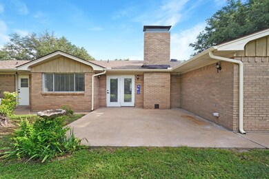 Back of property featuring a patio area