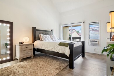 Upstairs, the primary bedroom offers direct access