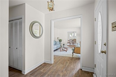 Deep closet for coats, storage and cleaning items.