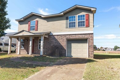 View of front of house featuring a front yard and 