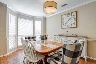 Formal dining room is perfect for an intimate dinn