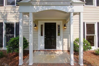 FRONT PORCH: The desirable covered front porch sho