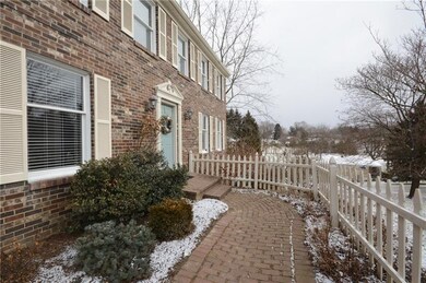 Brick pathway leading to front door. Beautiful lan