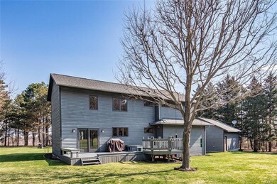 Entertaining sized deck.  Backyard is boardered by