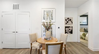 Dining space featuring light wood-type flooring