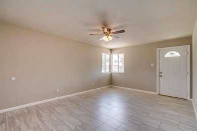 Entry to Great Room w/ Wood Plank Tile