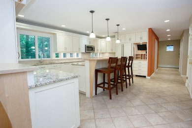 Custom Wolfworks kitchen is fun and functional