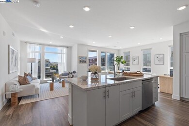 Chef’s kitchen with quartz counters, stainless appliances, and large entertaining island
