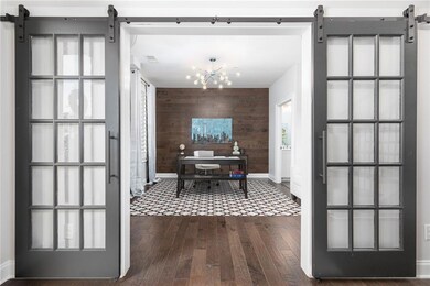 Looking from the foyer into the 1st floor Office / Bedroom Suite.