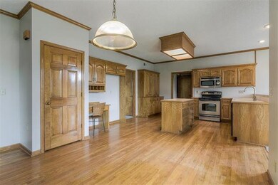 Abundant Cabinetry with half bath and laundry off 