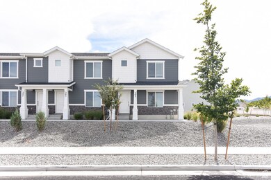 Craftsman inspired home featuring stone siding and covered porch