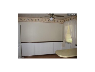 Here is a view of the dinette area with ceiling fa