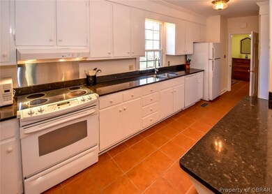 Kitchen has Ample Cabinetry for Storage.